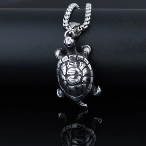 Vintage stainless steel sea turtle pendant necklace with detailed shell texture on ball chain