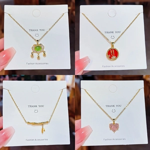 18K gold-plated titanium steel necklace set with pearls, rabbit, and heart pendants