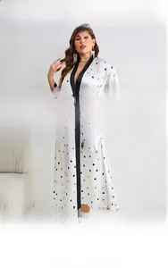 Detail view of heart print imitation silk robe showing washing instructions and fabric info