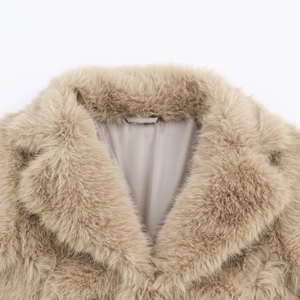 Women's faux fur jacket featuring a stylish wide lapel in a soft light camel shade