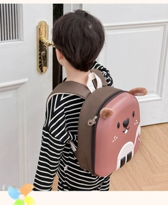 Detail of child wearing squirrel shell backpack with 3D ears and adjustable straps