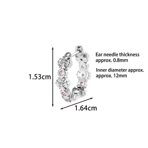 Créoles argentées à motif de croix avec pierre rose et guide des dimensions