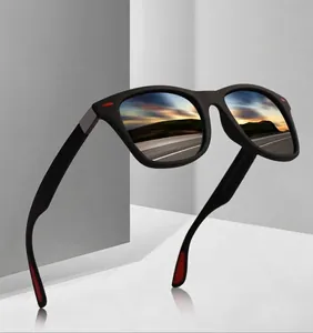 Fashionable sports sunglasses with black frames and reflective lenses for driving