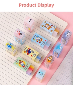 Dettaglio di gomme da cancellare colorate con motivi 3D di spazio e animali per la scuola