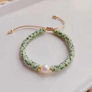 Bohemian adjustable layered bracelet with green clay beads and white baroque pearl