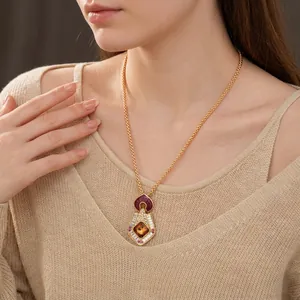 Vintage gold diamond rhombus necklace with amber gemstone in baroque luxury style