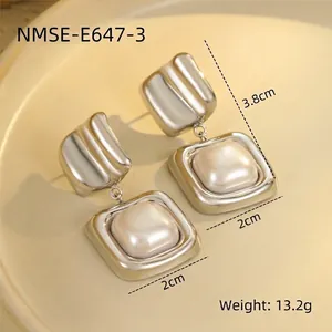 Detail of silver drop earrings with square baroque pearls showing size 3.8cm by 2cm