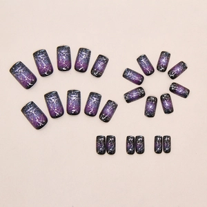 Starry galaxy press on nails with purple black gradient and constellation patterns