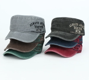 Detail of distressed cotton cadet caps in six colors with embroidered Always Awake text