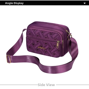 Macro view of purple nylon crossbody bag with heart quilting and zipper compartments
