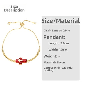 Detail showing red zircon cross pendant and adjustable copper gold-plated chain strap