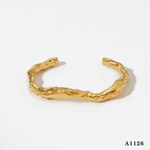 Elegant 316L stainless steel open bangle with irregular hammered texture in gold finish