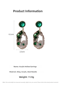 Detailed view of hollow green emerald earrings with measurements 6.1cm by 2.3cm