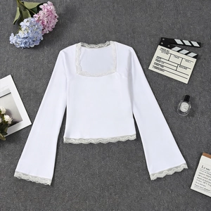 Close-up of white slim fit top featuring square neck and lace trumpet sleeve details