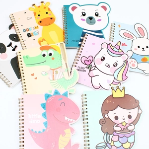 Flat lay of cute animal spiral notebooks with giraffe, unicorn and dino die-cut covers