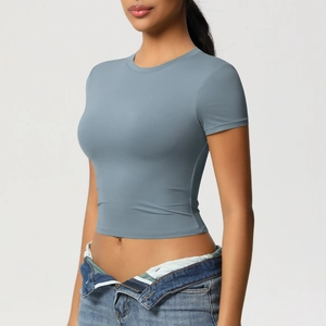 Detail shot of slim fit athletic t-shirt in grey blue featuring smooth breathable fabric