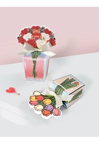 Detailed view of 3D tulip gift boxes with satin ribbons and elegant floral printing