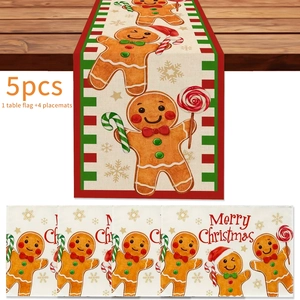 Christmas gingerbread man linen table runner and 4 placemats set on wooden background