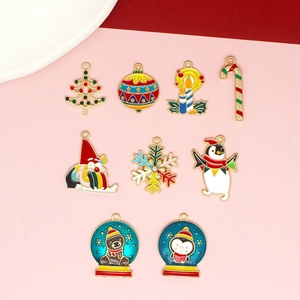 DIY Christmas charms collection featuring gold alloy pendants with festive enamel designs