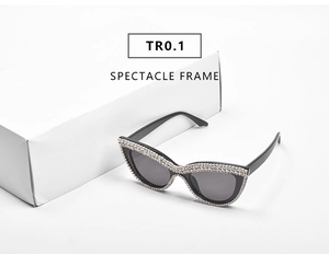 Detail of trendy cat-eye sunglasses with rhinestone-encrusted black frame and dark lenses
