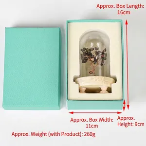 Natural crystal tree ornament with colorful stones in glass dome with a gift box