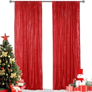 Close-up of red sequin fabric texture with festive holiday decor and gift boxes