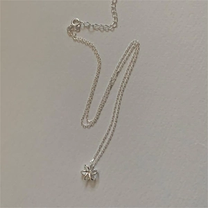 Detail of 925 sterling silver flower pendant necklace with O-chain and lobster clasp