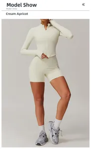 Détail du short de yoga taille haute abricot crème et veste zippée en tissu respirant