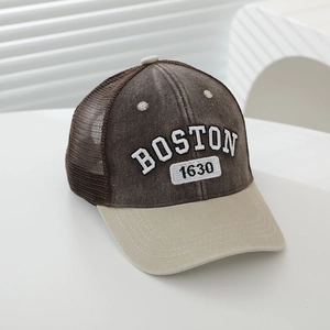 Detail of Boston 1630 embroidery on retro brown and beige mesh trucker hat for kids