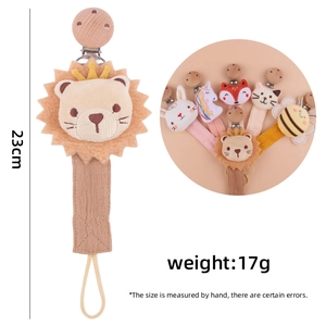 Beech wood pacifier clip with plush lion head and cotton linen strap length 23cm
