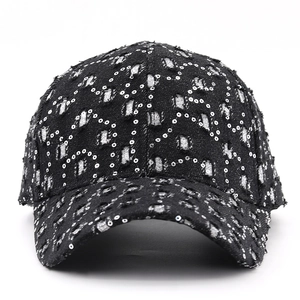Front detail of distressed denim baseball cap with silver sequins in geometric patterns