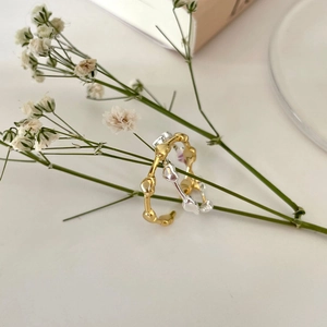 925 sterling silver heart chain rings in gold and silver finish on dried flower branch