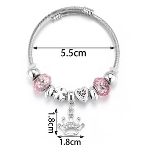 Silver crown charm bracelet with pink beads, adjustable size 5.5cm inner diameter