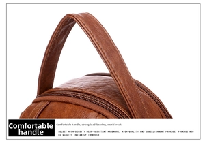 Detailed macro view of the soft lychee textured leather handle with reinforced double stitching