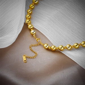 Golden titanium steel beaded necklace with S.Steel engraved tag and extension chain