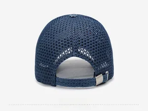 Detail view of the breathable mesh back and adjustable metal buckle on a navy baseball cap