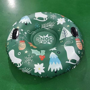 Close-up of PVC snow tube with winter pine motifs and sturdy black handles