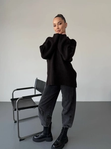 Oversized black crewneck knit sweater for women with a relaxed slouchy fit for autumn