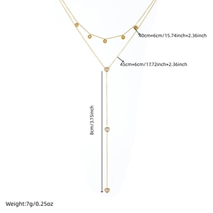 Double layered gold-plated stainless steel necklace with heart and CZ stone charms