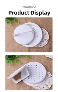 Detailed view of white plastic hamburger patty press and components with handle