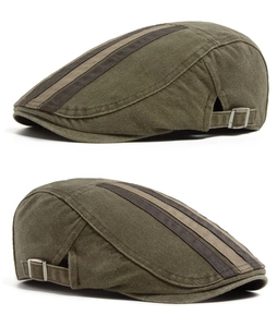 Detail of army green washed cotton flat cap with side adjustable metal buckle
