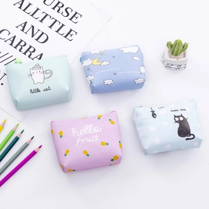 Detail of four cartoon PU leather coin purses with star zipper pulls and cute animal prints