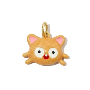 Detail of cartoon hamster enamel charm with golden metal ring for DIY jewelry making