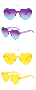 Detail of rimless heart-shaped sunglasses in purple-blue gradient and vibrant yellow