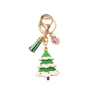 Christmas tree keychain with green tassel and sequin star pendant in a clear globe