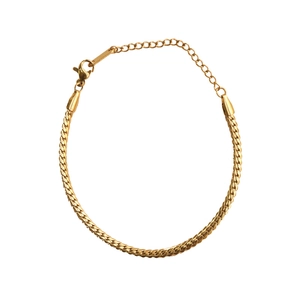 Flat gold snake bone chain bracelet with lobster clasp and adjustable link extension