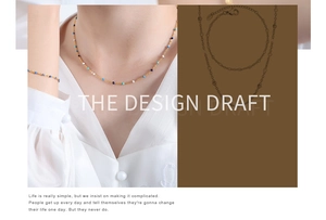 Detail showing the design draft and matching gold chain jewelry set with colorful enamel beads
