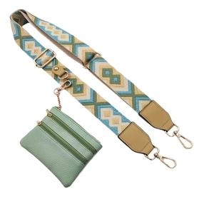Adjustable woven crossbody strap with geometric pattern and mint green coin purse
