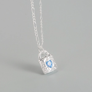 925 silver necklace featuring a lock pendant with a blue heart-shaped zircon gemstone