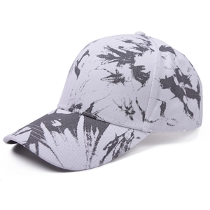 Detailed side view of tie-dye baseball cap with black and white abstract splash pattern